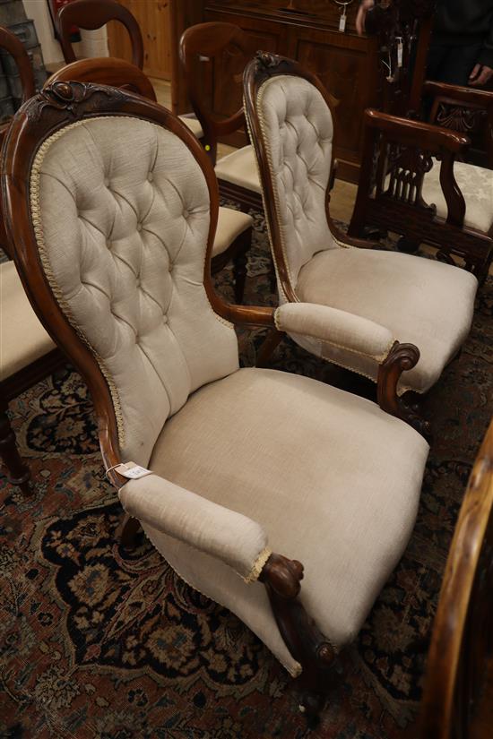 A Victorian mahogany spoonback armchair and matching nursing armchair